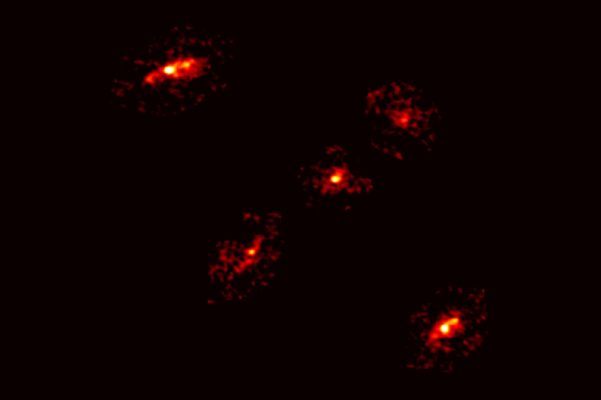 Unprecedented ‘Einstein Cross’ Reveals Fifth Ghost Image and a Dark Matter Surprise