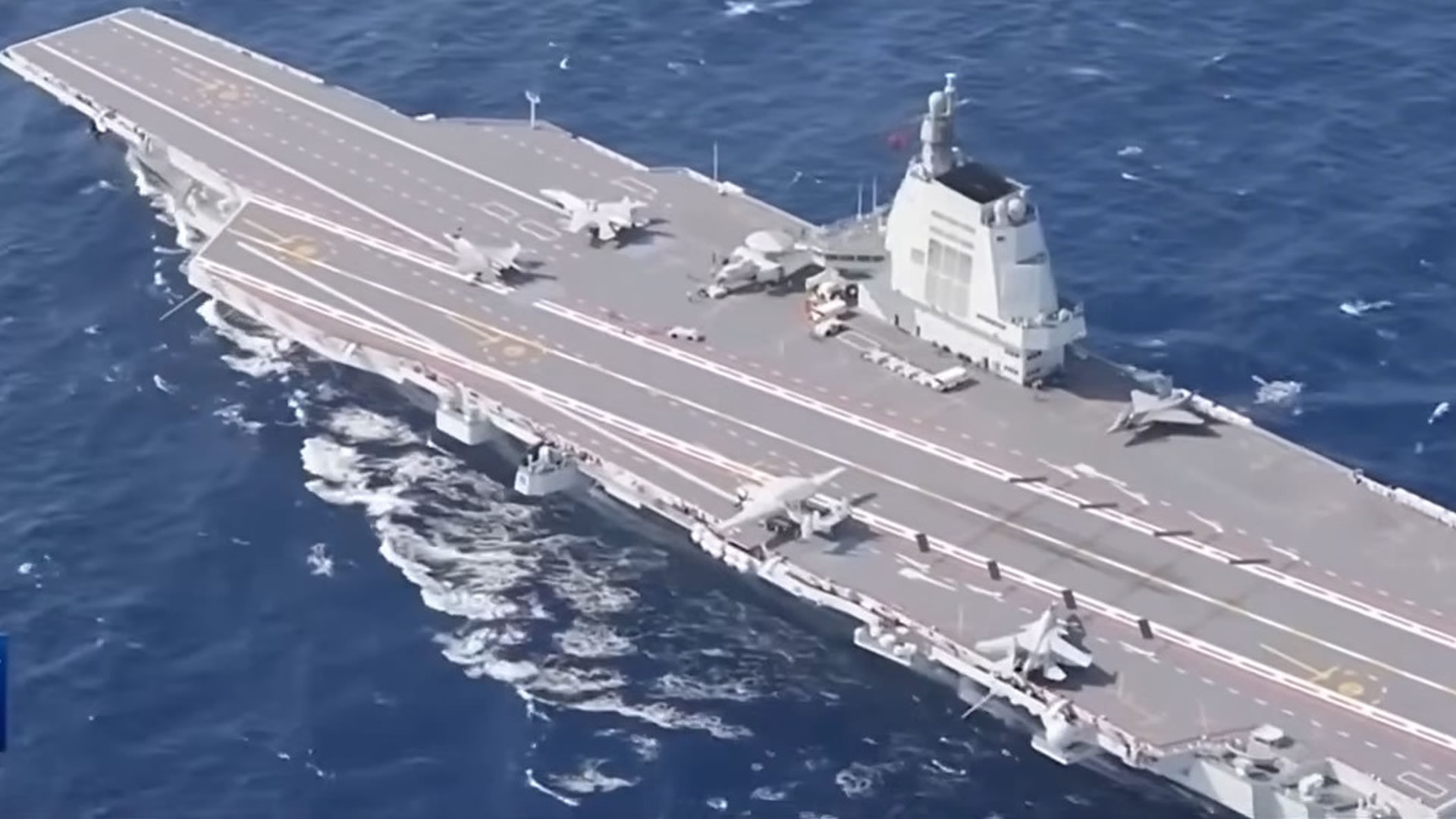 China docks 80,000-ton Fujian, 60,000-ton Liaoning aircraft carriers in military zones