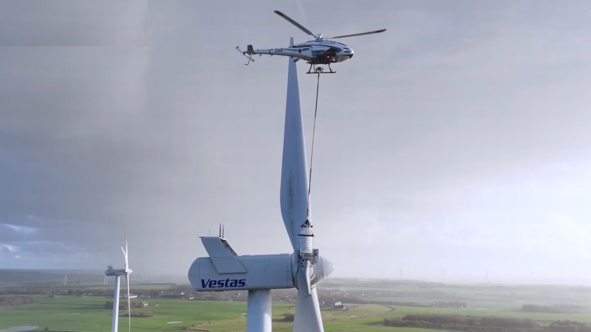 Video: Autonomous robot hitches a helicopter ride to service risky wind turbine blades