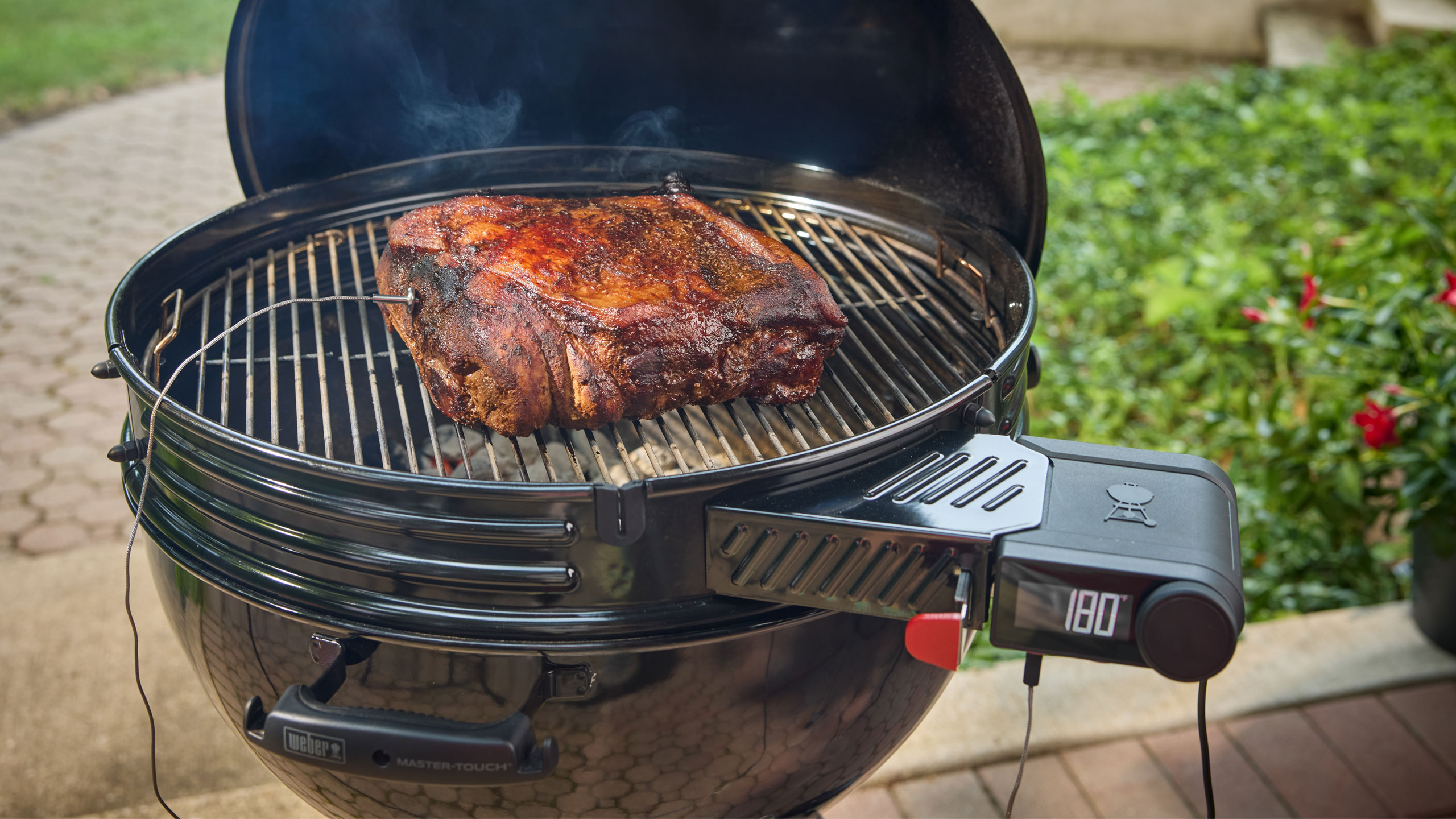 Weber’s 2026 smart grill lineup includes the company’s first Wi-Fi-equipped charcoal grill