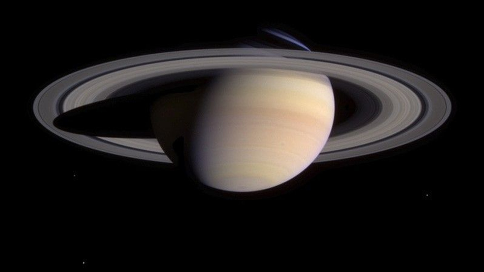 Was Titan born from a crash? This moon merger may have created Saturn’s rings
