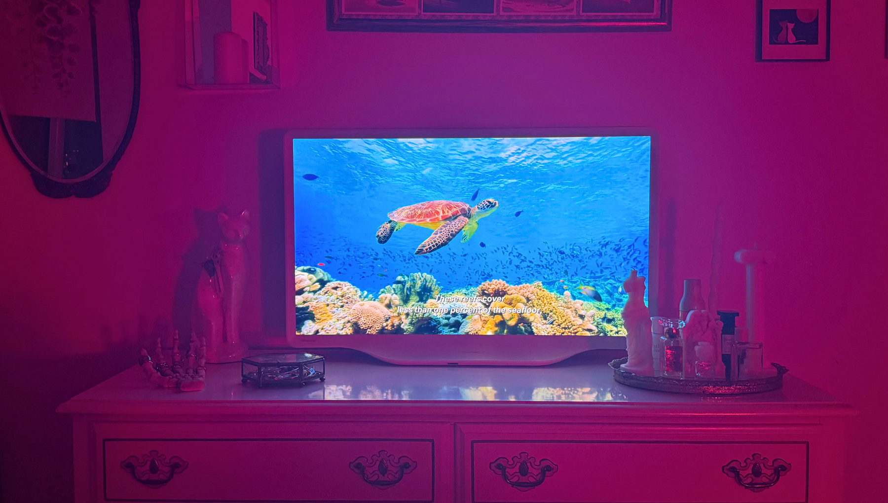 Looksmaxxing my bedroom TV with the Hisense Déco: The chic, small, budget QLED TV that blends in with my decor
