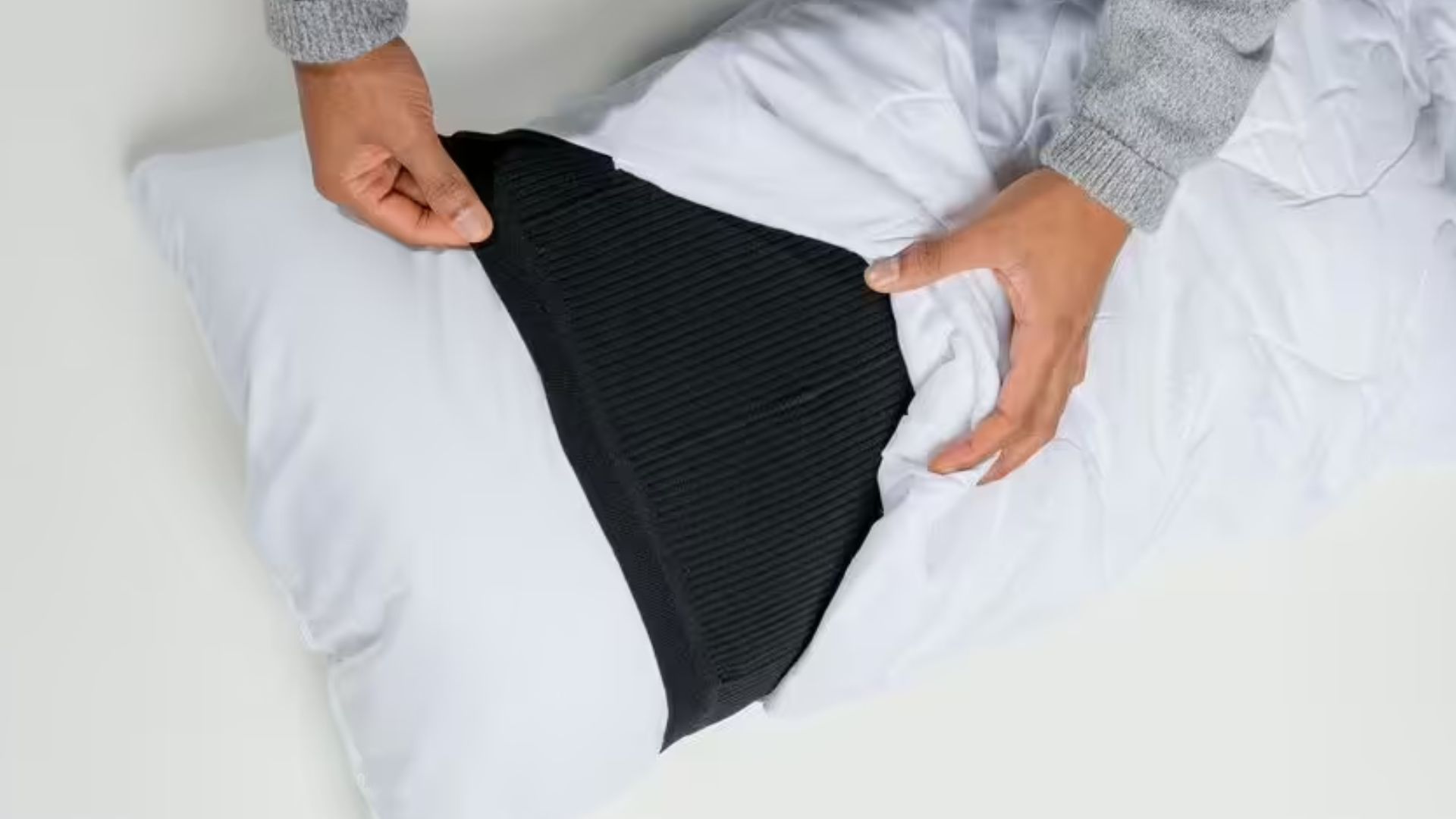Smart pillow sleeve uses vibrations to alert deaf users to emergencies at night