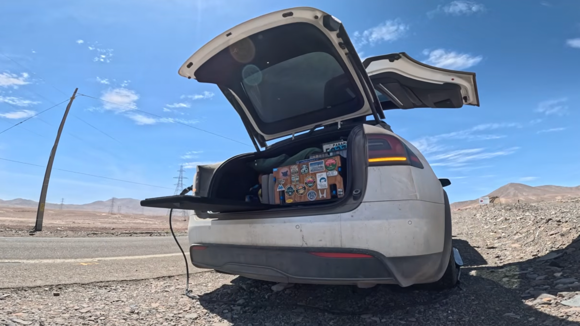 Tesla hits 0% charge in remote Chilean desert as YouTuber uses hood-mounted solar