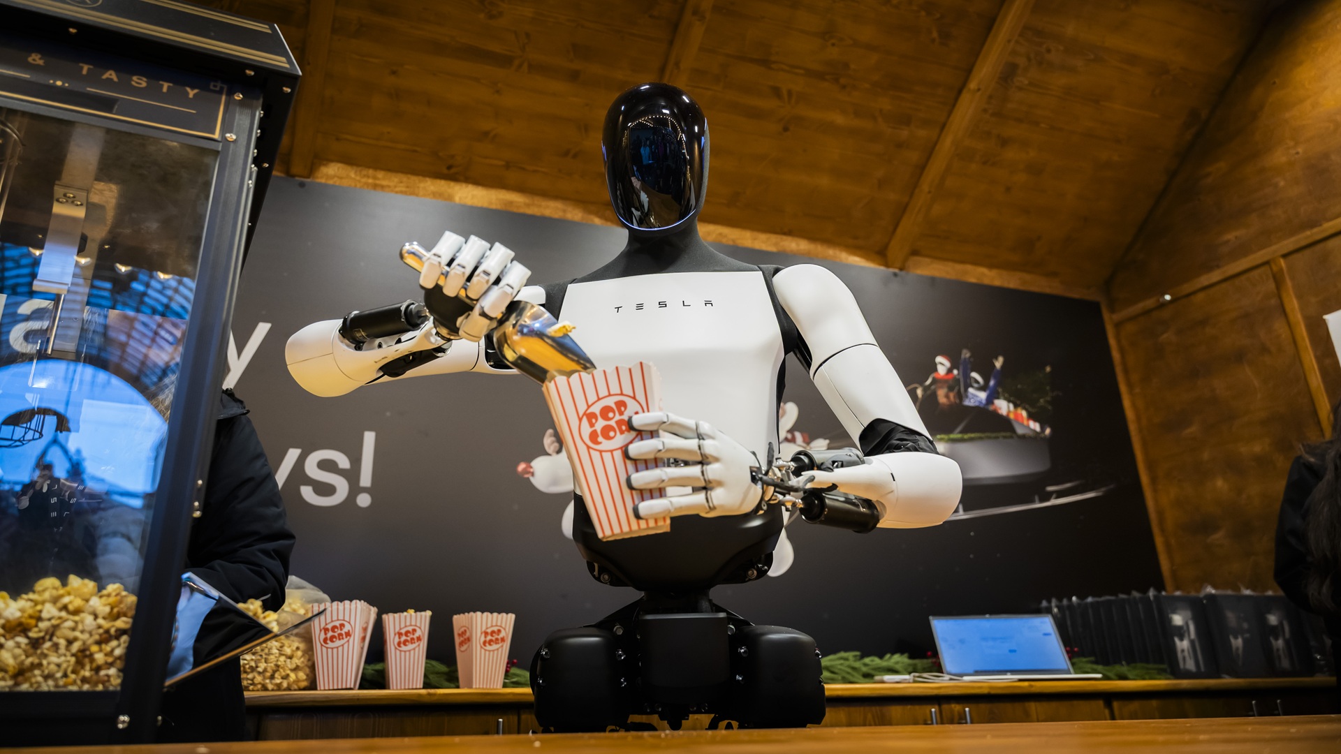 Tesla’s Optimus humanoid robot greets runners, poses for photos at Boston Marathon