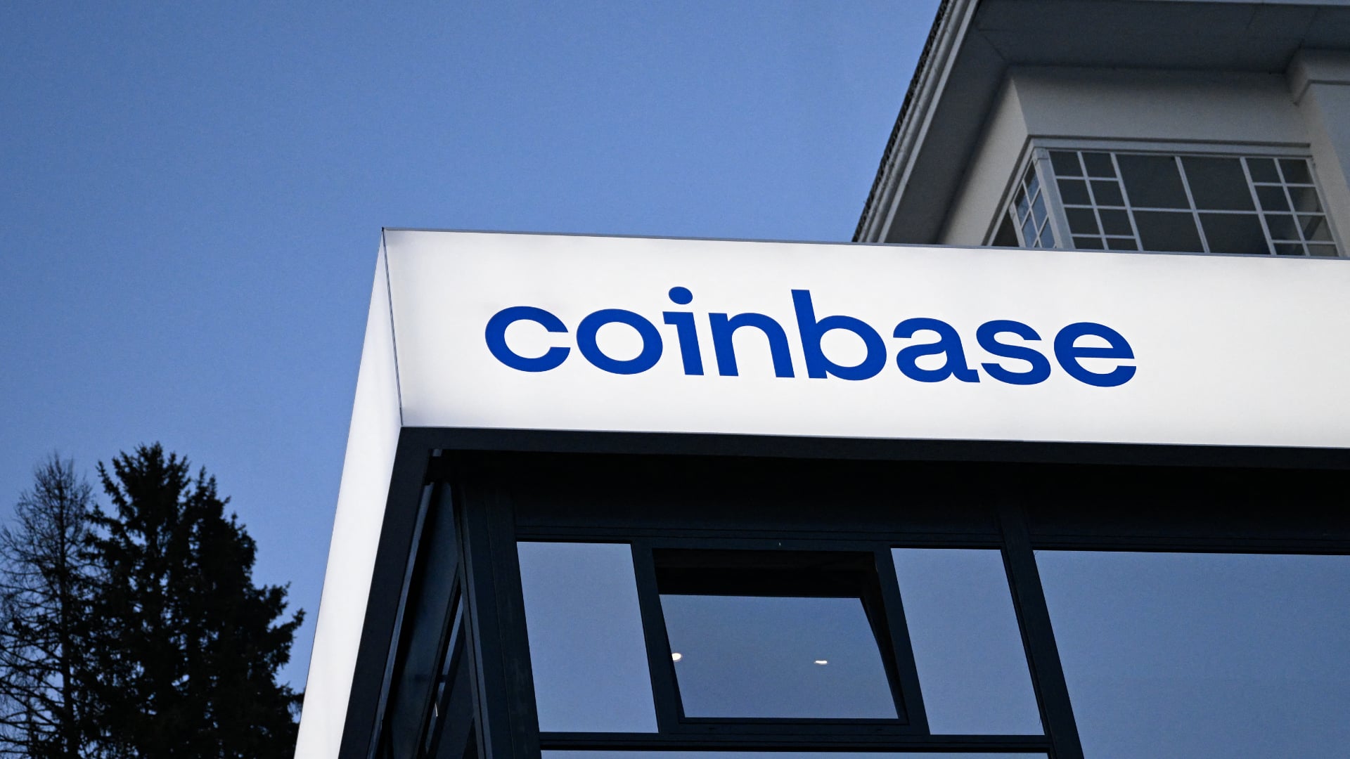 Coinbase to lay off 14 percent of workforce over AI concerns