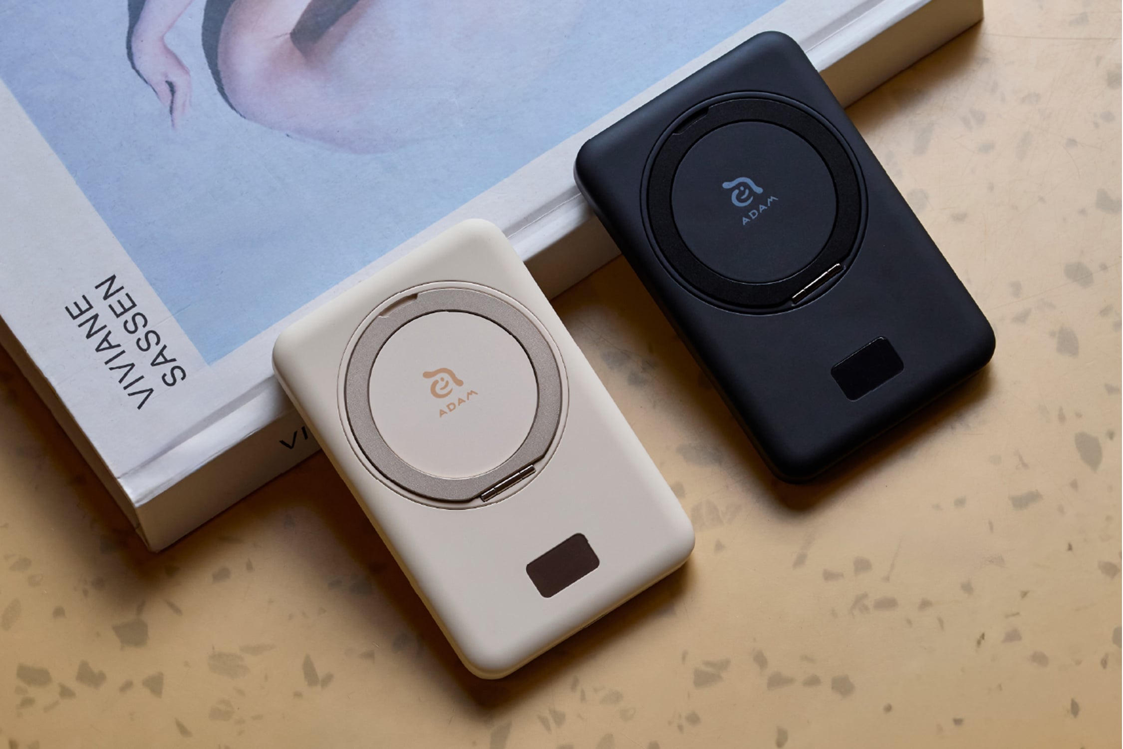 Stay charged on the go for $60 with this compact power bank and built-in stand