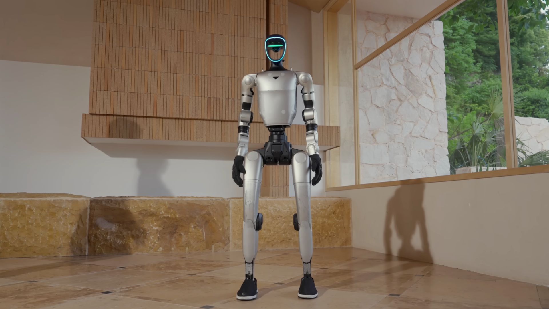 Tokyo summit wows audience with humanoids and robotic hands that can thread a needle
