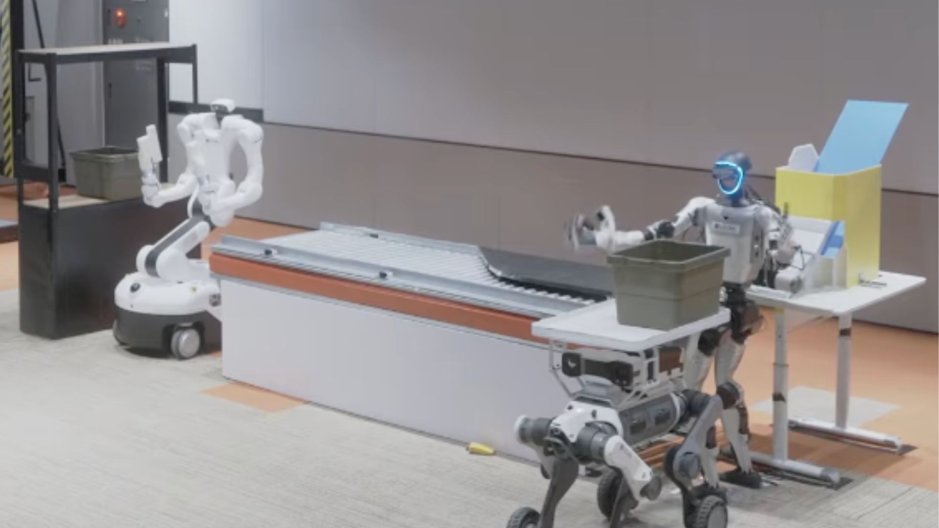 Watch humanoid and dog-like robots team up to handle warehouse work together at LG