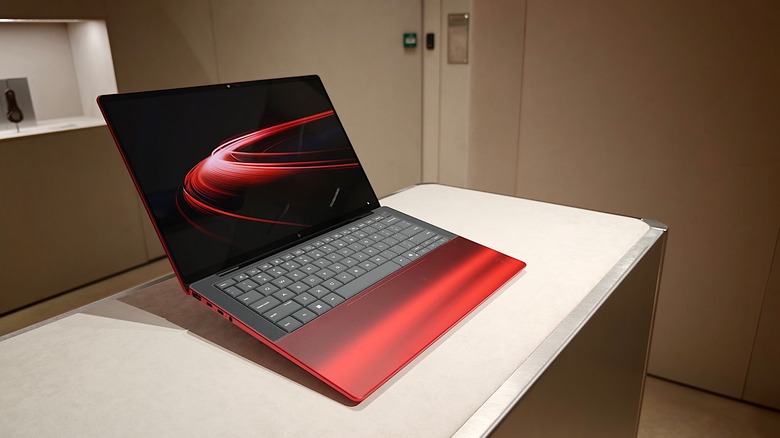 Ferrari and HP made a vivid red laptop with a transparent ‘engine bay’