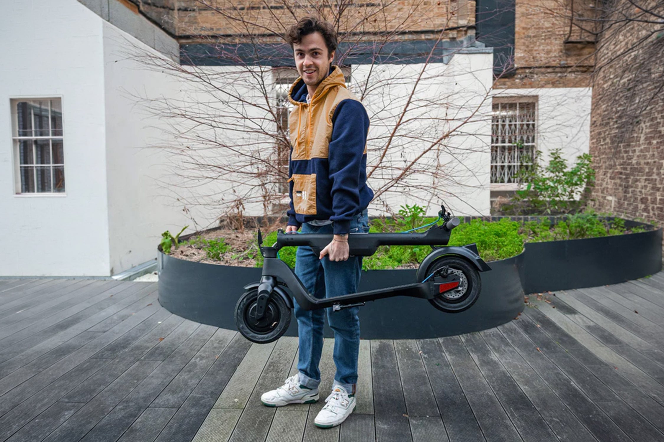 Get around town on this $390 foldable e-scooter that goes up to 25mph