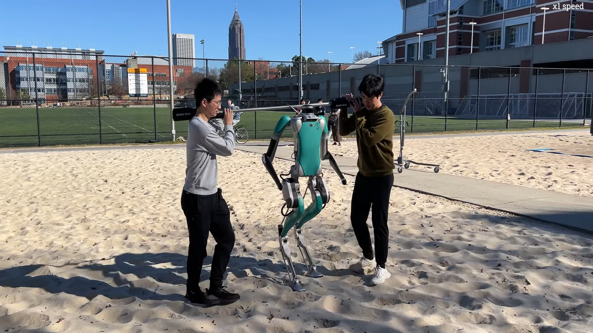 Humanoid robot walks across sand, gravel and slopes using faster training framework