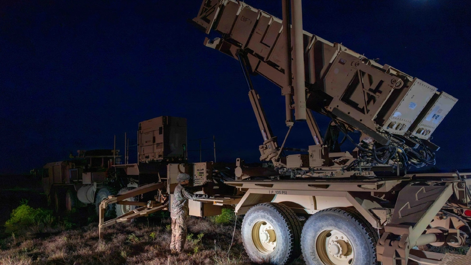 US Army drills nighttime Patriot reloads with crane truck at Fort Hood